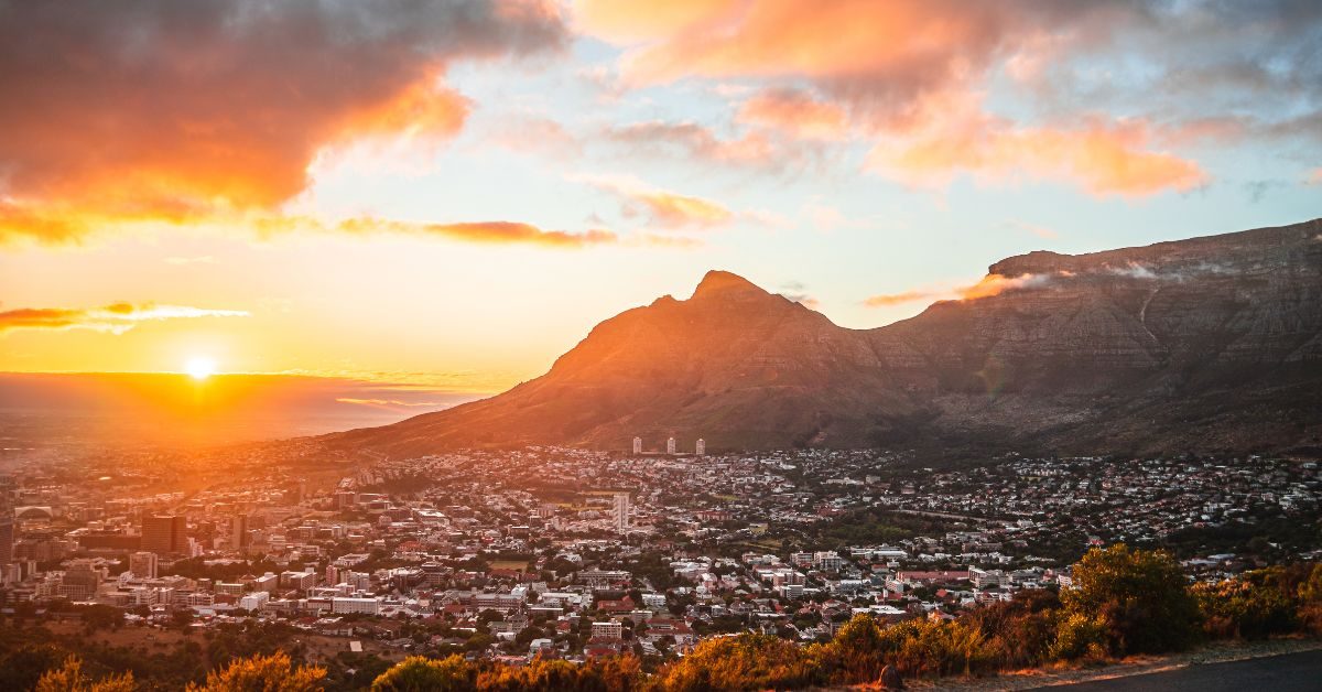 An aeroplane over Cape Town at sunset